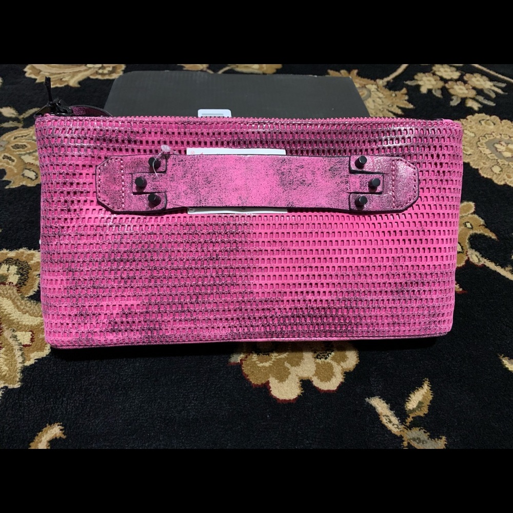 SHE + LO Fuschia/Black Perforation clutch